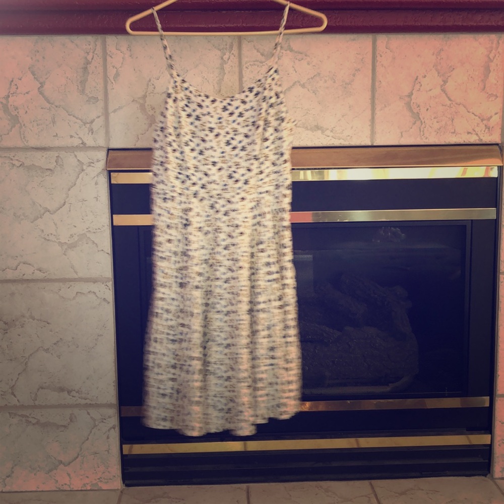 White dress with blue flowers